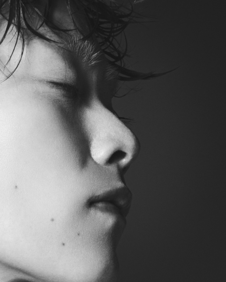 Black-and-white close-up portrait