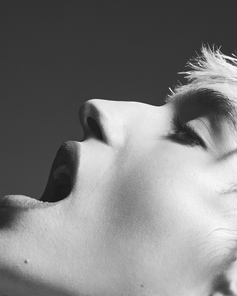 Black-and-white reclining face close-up